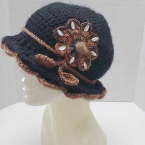 Lined Black Hat with Large Flower and Tassel Leaves